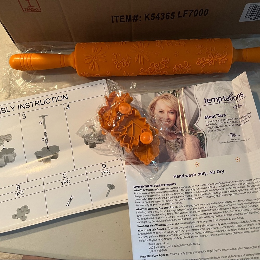 Temptations Orange Kitchen Tool Set. Rolling pin with embossing patters -cutters